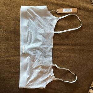 Skims White Bralette NWT but smudge near Skims logo
